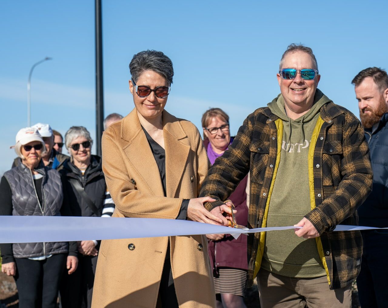Steve and Thea Farquharson cutting the ribbon at ceremony.